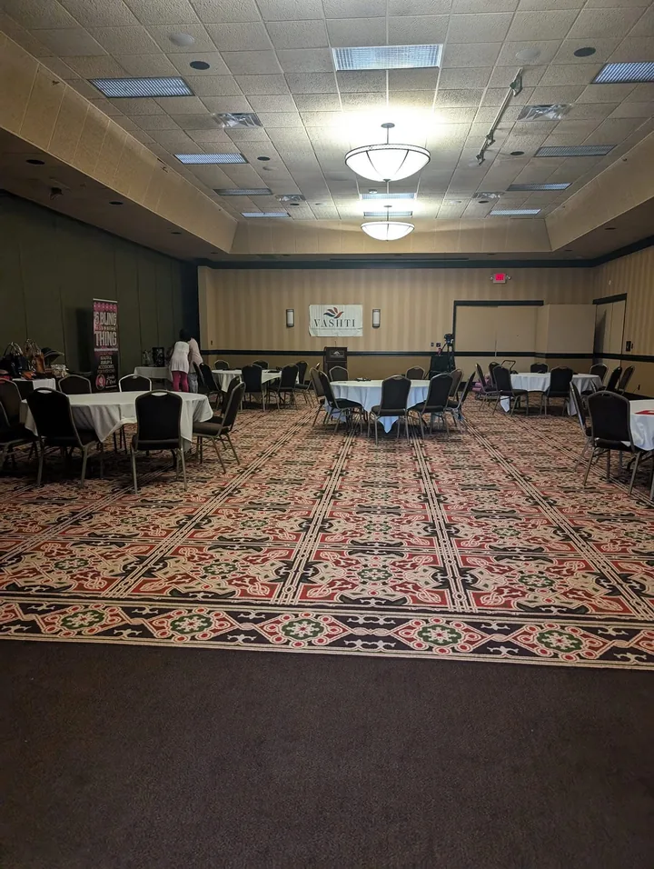 Tables and presentation equipment prepared for a VASHTI community program